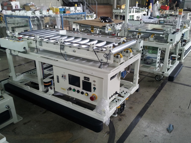 積載型 AGV(鋳物製品搬送)